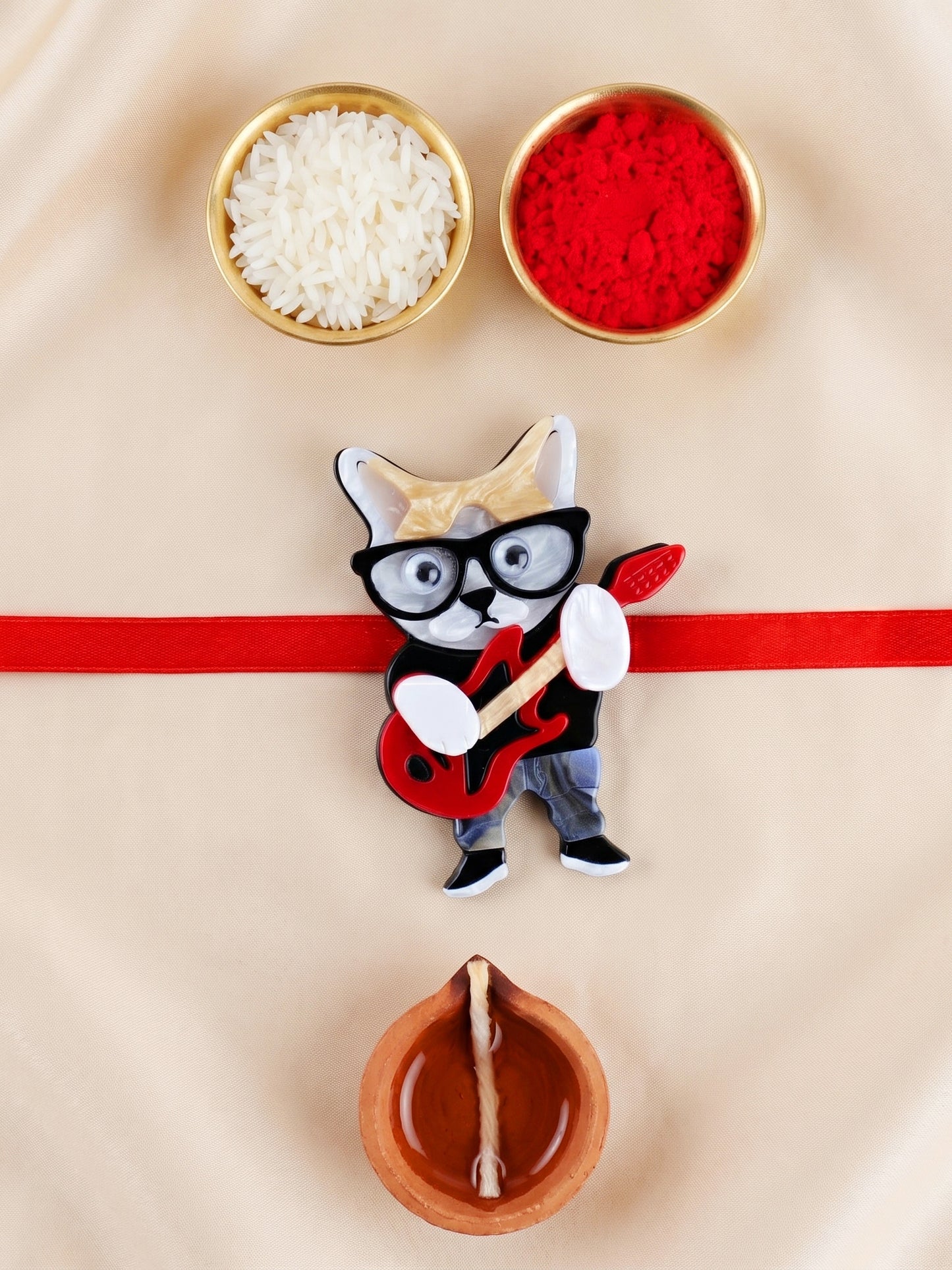 Kids Rakhi: Cute Rockstar Cat Playing Guitar Acrylic Charm on Red Ribbon, Roli, Chawal & Card (440-CHR1-1192-1-2026)