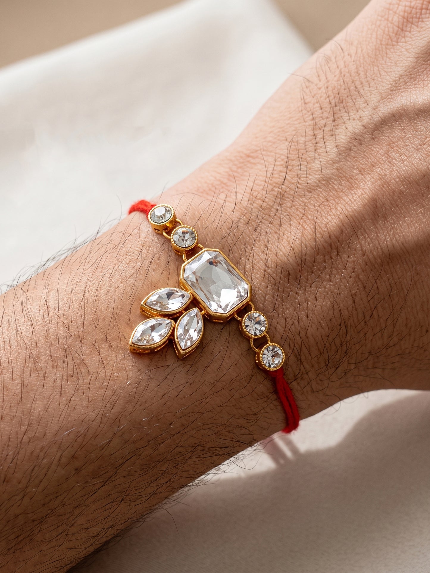 LUCKY JEWELLERY Traditional Rakhi for Brother/Bhaiya – Gold Plated Red Thread Rakshabandhan Rakhie White Stones for Bhai/Bhabhi (Pack of 3) – Fancy Rakhee Bracelet Rakshasutra (159-L1R1-01-W-3-2026)