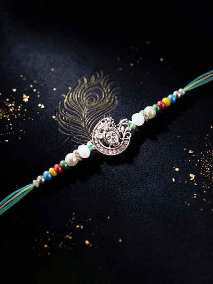 Silver-Tone Bal Gopal Krishna Rakhi for Brother | Beaded Rakhi Set With Roli Chawal & Greeting Card (102-S5R1-AR3007)