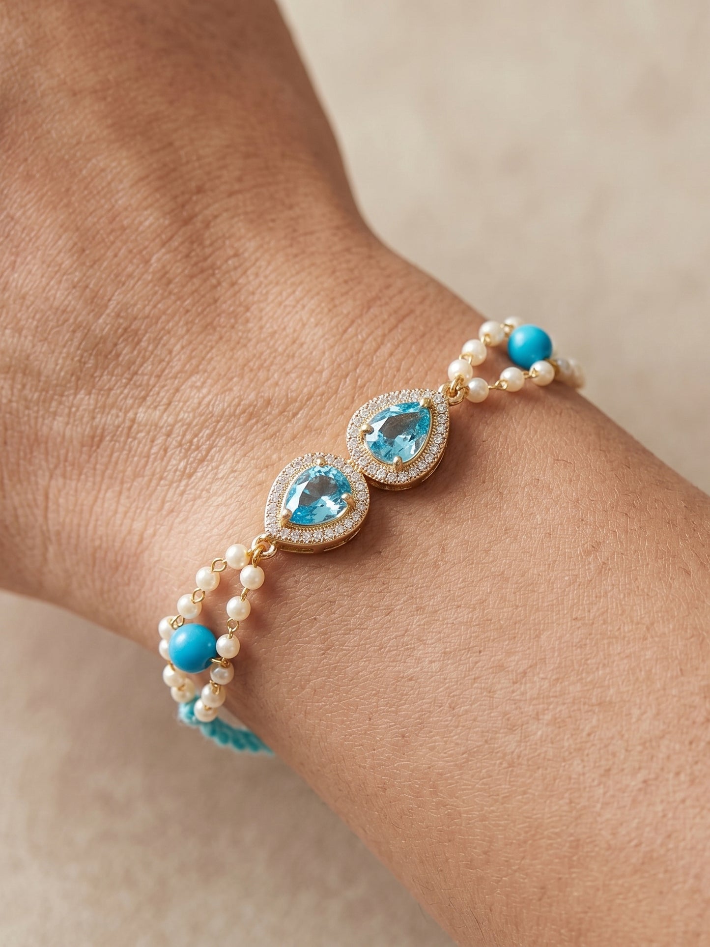 Adjustable Rakhi Bracelet with Blue drop AD Pendant, Turquoise & White Beads on Double Chain (200-CHB2-1279-F-2026)