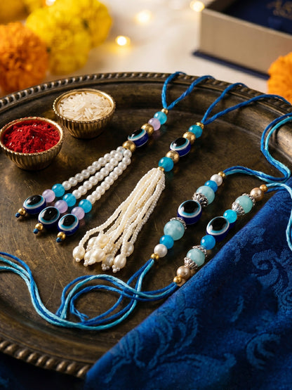 Rakhi Set of 4 with Small Evil Eye Lumba, Blue & Gold Beads, Roli Chawal & Card (116-J5R1-1991-EE-4-2026)