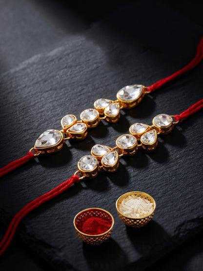 LUCKY JEWELLERY Traditional Rakhi for Brother/Bhaiya – Gold Plated Red Thread Rakshabandhan Rakhie White Stones for Bhai/Bhabhi (Pack of 2) – Fancy Rakhee Bracelet Rakshasutra (159-L1R1-07-W-2-2026)