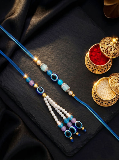 Set of 2 Bhaiya Bhabhi Evil Eye Rakhi Set with Blue & White Beads, Lumba Tassel, Roli Chawal & Card (75-J5R1-1993-EE-2-2026)