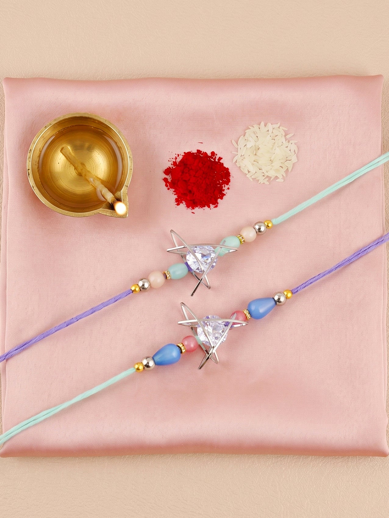 Set of 2 Rakhi with Silver Geometric AD Pendant, Pastel Beads, Roli Chawal & Card (225-CHR1-1004C-S-2-2026)