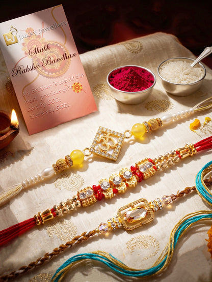 Lucky Jewellery Set of 3 Rakhi with Om & Crystal Pendants, Smooth White Beads, Roli Chawal & Card (160-S7R1-2321-3)