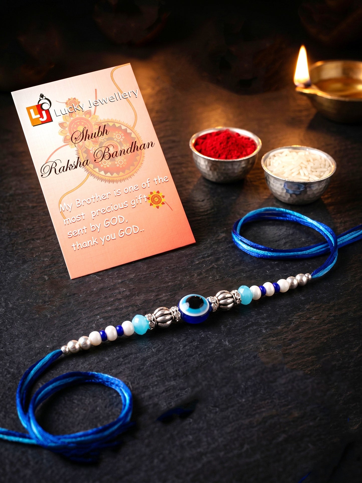 Blue Evil Eye Rakhi with Greeting Card and Roli Chawal Set for Rakshabandhan (54-S5R1-RN2239)