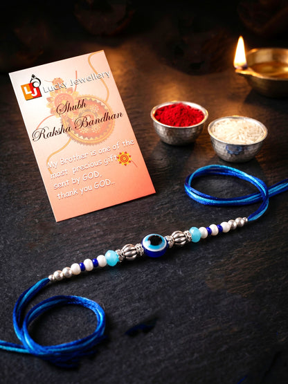 Blue Evil Eye Rakhi with Greeting Card and Roli Chawal Set for Rakshabandhan (54-S5R1-RN2239)