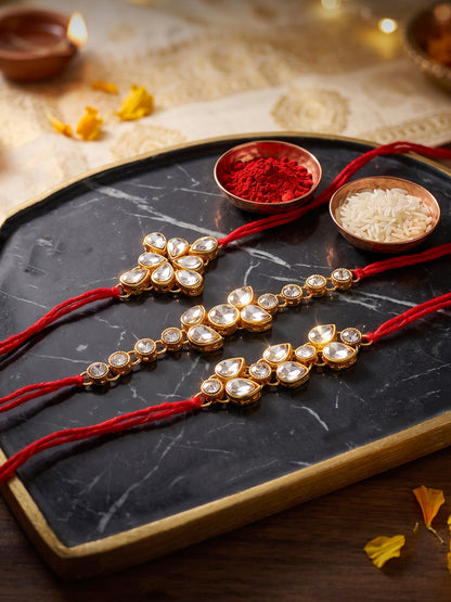 LUCKY JEWELLERY Traditional Rakhi for Brother/Bhaiya – Gold Plated Red Thread Rakshabandhan Rakhie White Stones for Bhai/Bhabhi (Pack of 3) – Fancy Rakhee Bracelet Rakshasutra (159-L1R1-09-W-3-2026)