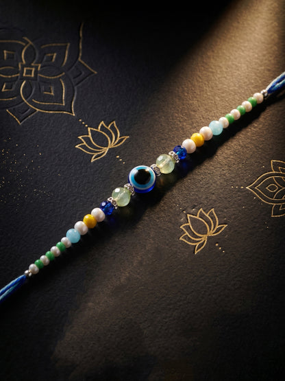 Blue Evil Eye Rakhi with Greeting Card and Roli Chawal Set for Rakshabandhan (57-S5R1-RN2244)