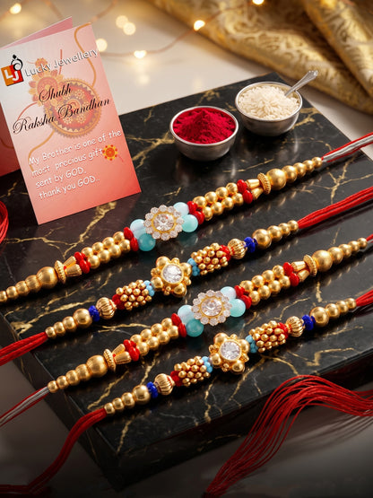 Lucky Jewellery Set of 4 Rakhi with Small Crystal Floral Centerpieces, Gold-Tone Beads, Roli Chawal & Card (58-S7R1-2314-4)