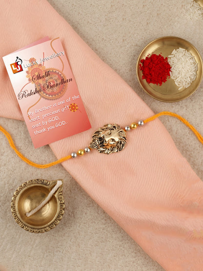Golden Lion Pendant Rakhi for Brother with Metallic Beads, Roli Chawal & Card (140-CHR1-1175-1-2026)