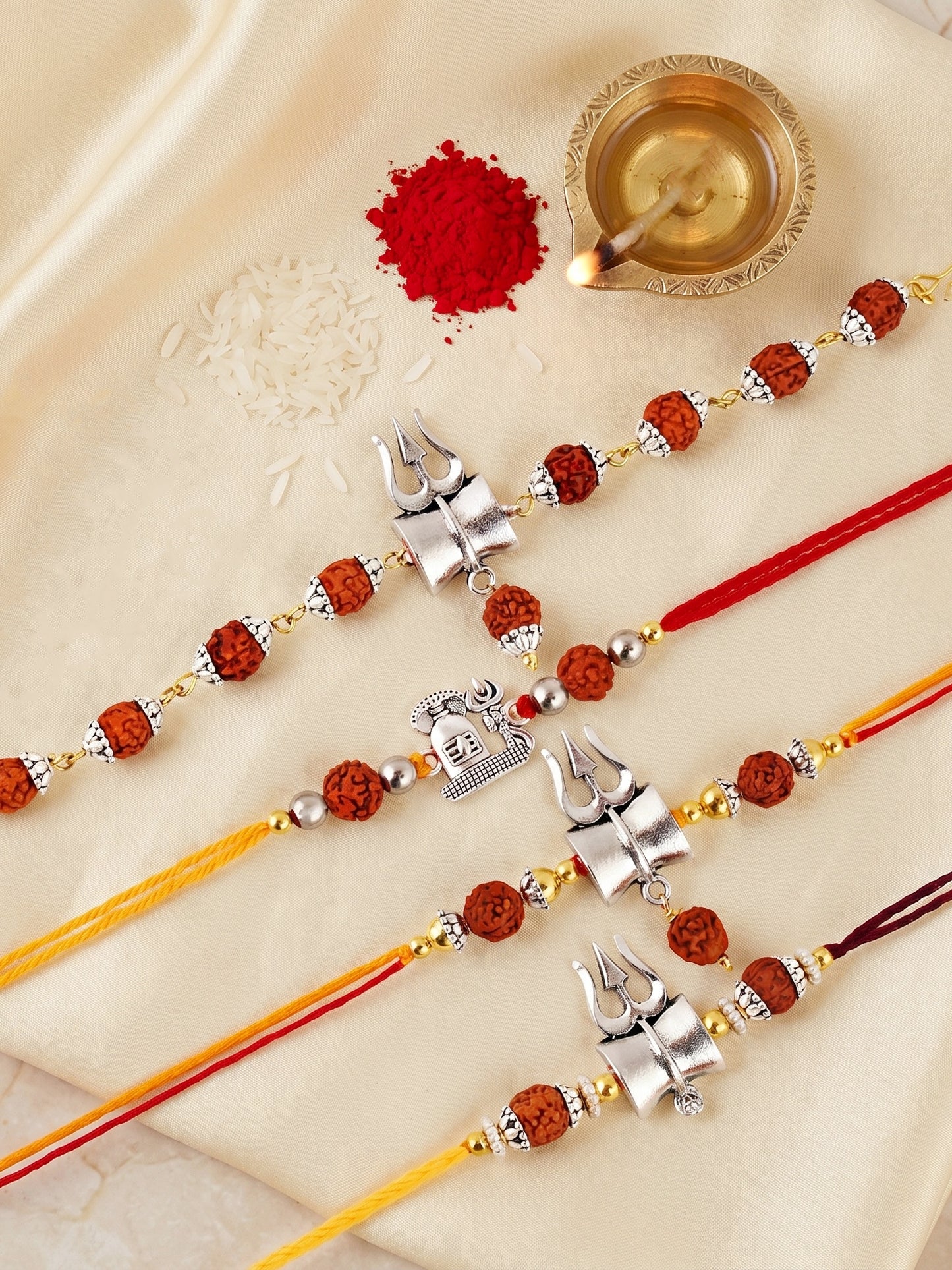 Rudraksha Rakhi Set of 4 for Brothers With Silver Trishul Design with Roli, Chawal & Card (241-JPR1-1982-S-4-2026)