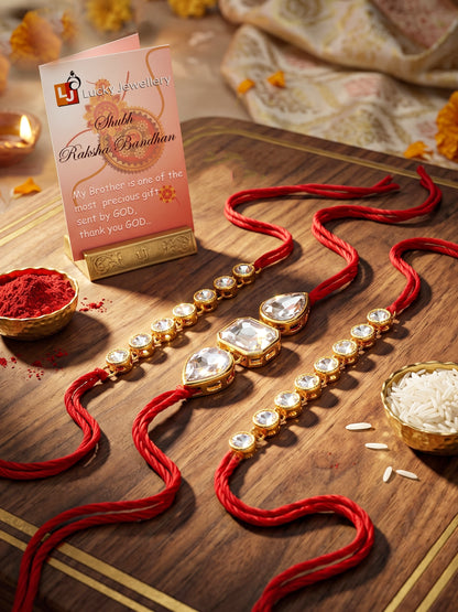 LUCKY JEWELLERY Traditional Rakhi for Brother/Bhaiya – Gold Plated Red Thread Rakshabandhan Rakhie White Stones for Bhai/Bhabhi (Pack of 3) – Fancy Rakhee Bracelet Rakshasutra (159-L1R1-08-W-3-2026)
