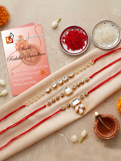 LUCKY JEWELLERY Traditional Rakhi for Brother/Bhaiya – Gold Plated Red Thread Rakshabandhan Rakhie White Stones for Bhai/Bhabhi (Pack of 3) – Fancy Rakhee Bracelet Rakshasutra (159-L1R1-01-W-3-2026)