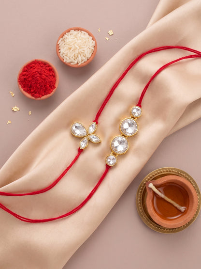 LUCKY JEWELLERY Traditional Rakhi for Brother/Bhaiya – Gold Plated Red Thread Rakshabandhan Rakhie in White Stones for Bhai/Bhabhi (Pack of 2) – Fancy Rakhee Rakshasutra (152-L1R1-06-10-W-2-2026)