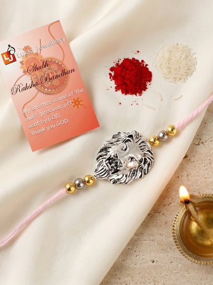Silver Lion Pendant Rakhi for Brother with Metallic Beads, Roli Chawal & Card (140-CHR1-1175-S-1-2026)