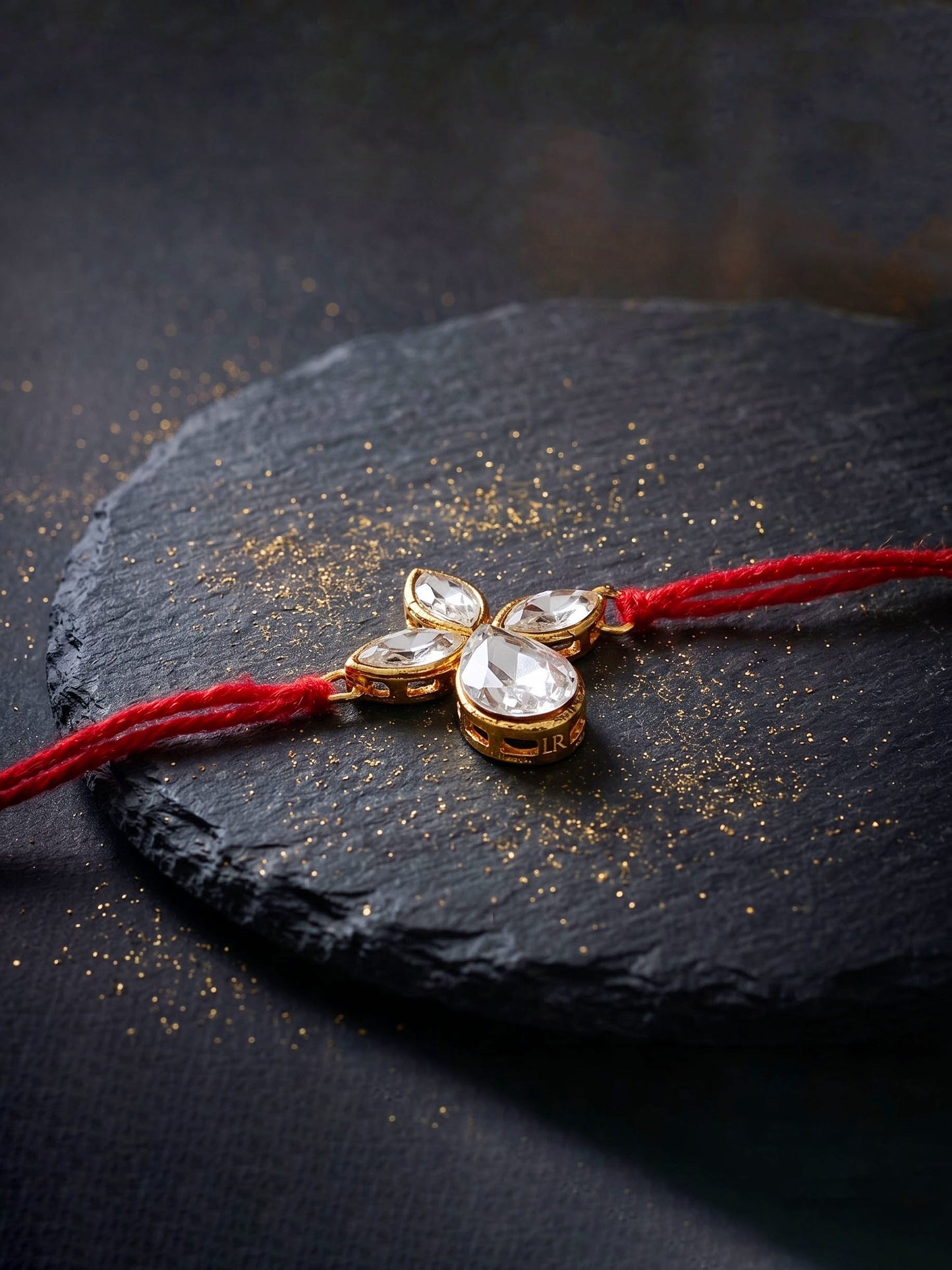 LUCKY JEWELLERY Traditional Rakhi for Brother/Bhaiya – Gold Plated Red Thread Rakshabandhan Rakhie in White Stones for Bhai/Bhabhi (Pack of 1) – Fancy Rakhee Bracelet Rakshasutra (76-L1R1-06-W-1-2026)