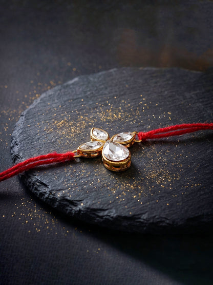 LUCKY JEWELLERY Traditional Rakhi for Brother/Bhaiya – Gold Plated Red Thread Rakshabandhan Rakhie in White Stones for Bhai/Bhabhi (Pack of 1) – Fancy Rakhee Bracelet Rakshasutra (76-L1R1-06-W-1-2026)
