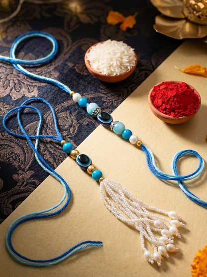 Rakhi Set of 4 with Small Evil Eye Lumba, Blue & Gold Beads, Roli Chawal & Card (116-J5R1-1991-EE-4-2026)