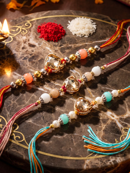 Set of 3 Designer Rakhis: Faceted Crystal Centerpiece & Multi Beads, Roli, Chawal & Card (300-CHR1-1002B-3-2026)
