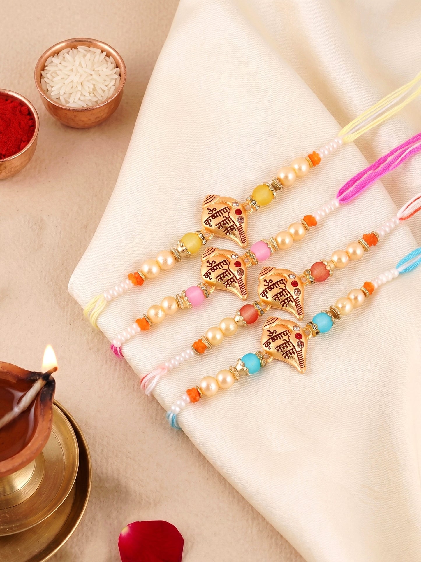 Lucky Jewellery Set of 4 Om Krishnaya Namah Shankh Rakhi for Brother with Roli, Chawal & Greeting Card (202-S7R1-2323-4)