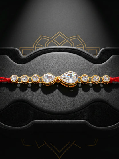 LUCKY JEWELLERY Traditional Rakhi for Brother/Bhaiya – Gold Plated Red Thread Rakshabandhan Rakhie White Stones for Bhai/Bhabhi (Pack of 4) – Fancy Rakhee Bracelet Rakshasutra (159-L1R1-02-W-4-2026)