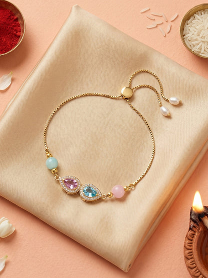 Adjustable Rakhi Bracelet with Blue & Pink drop AD Pendant,Pastel Beads,Roli Chawal & Card (209-CHB2-1279-PKF-2026)