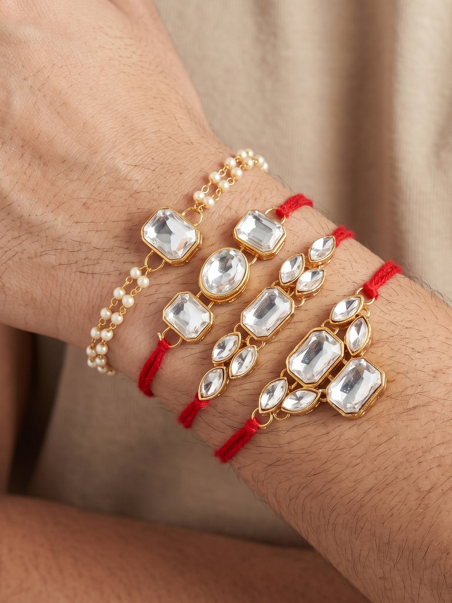 LUCKY JEWELLERY Traditional Rakhi for Brother/Bhaiya – Gold Plated Red Thread Rakshabandhan Rakhie White Stones for Bhai/Bhabhi (Pack of 4) – Fancy Rakhee Bracelet Rakshasutra (182-L1R1-18-W-4-2026)