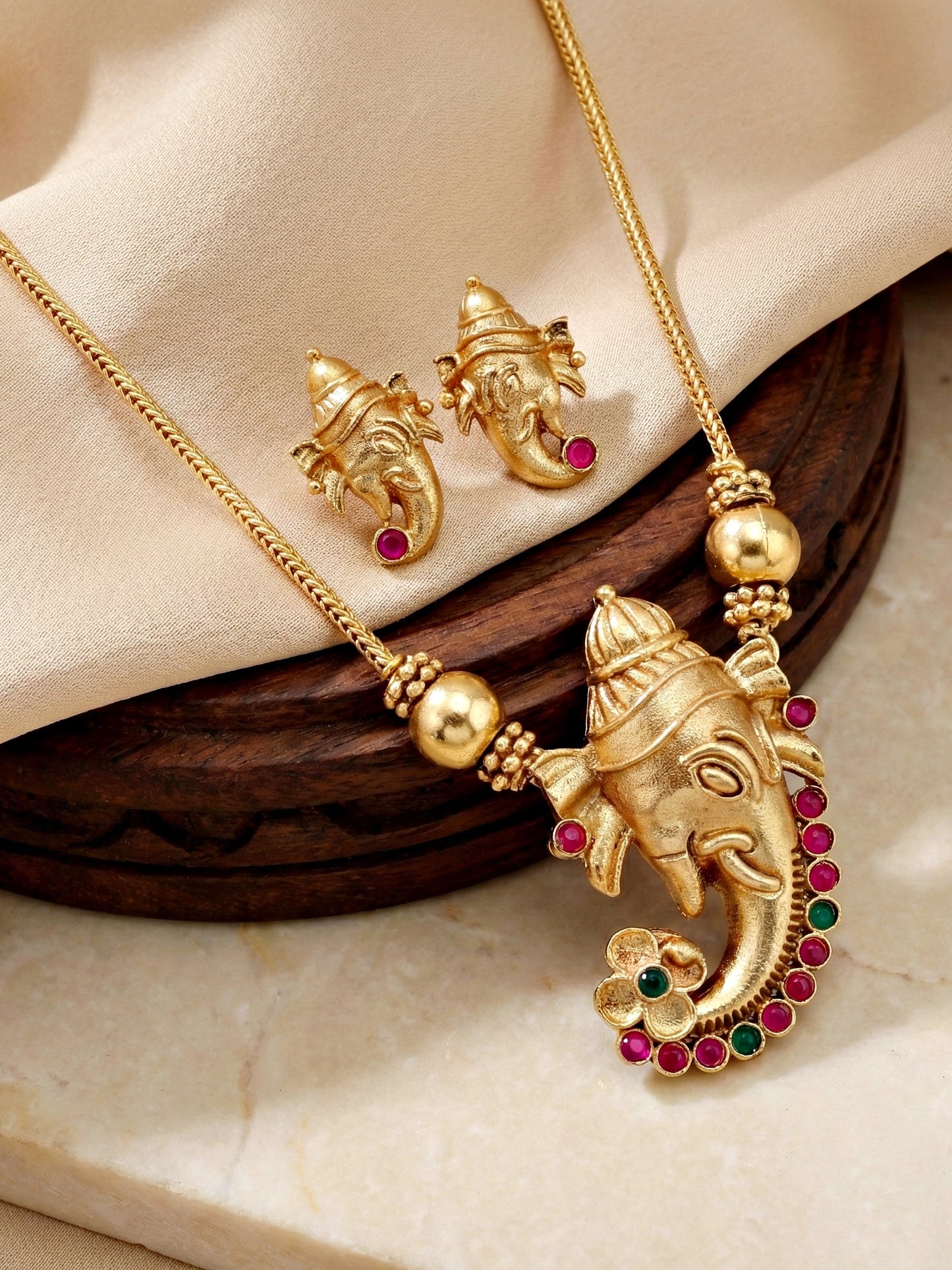 Traditional Gold-Tone Lord Ganesha Necklace Set with Pink & Green Stone Detailing | Temple Style Ethnic Jewellery with Stud Earrings for Festive & Wedding Wear (590-ISR-2181-RG)