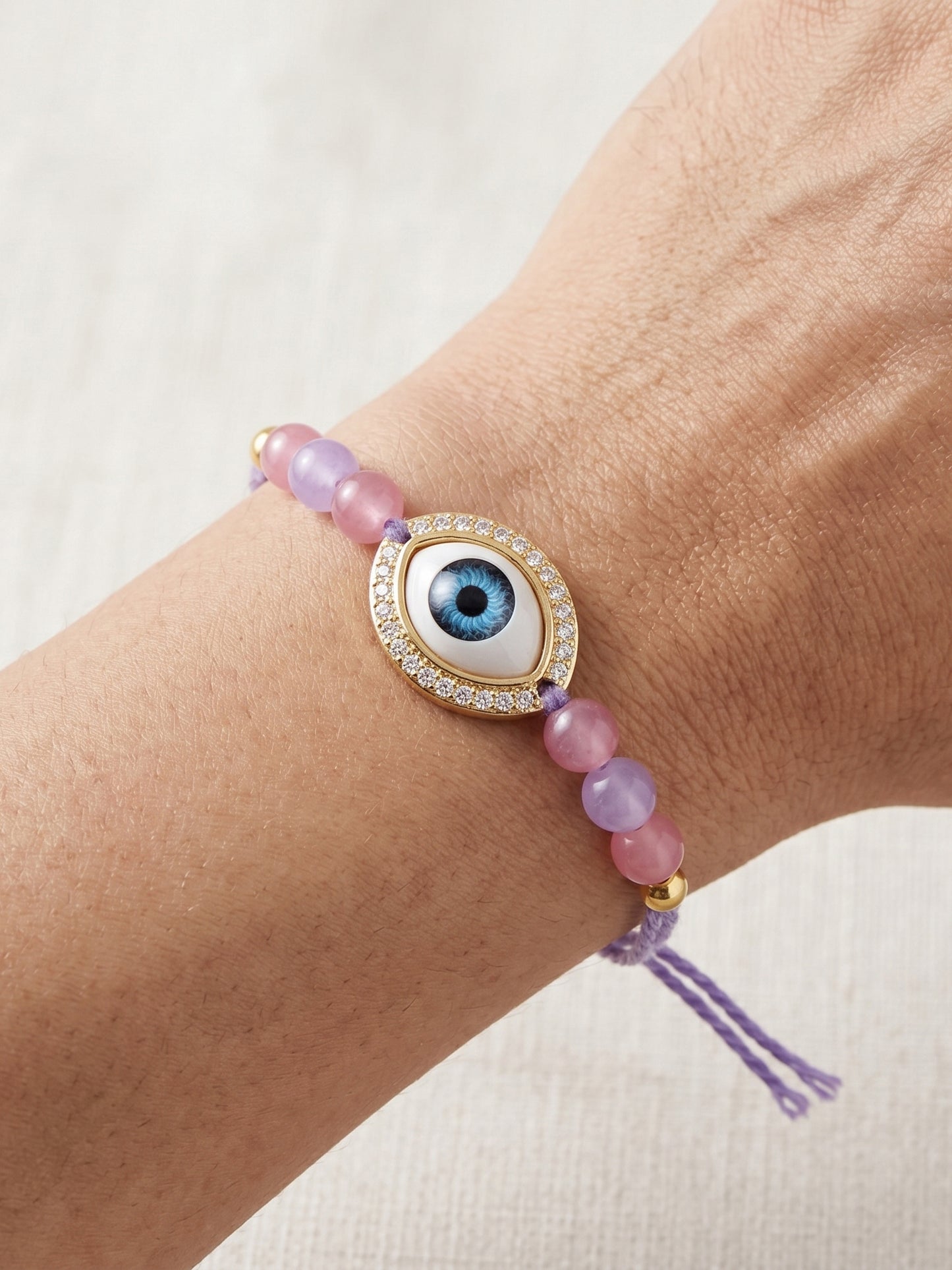 Evil Eye Rakhi for Brother. Protective Charm with Pastel Beads, Roli, Chawal & Card (265-CHR1-1191-P-1-2026)