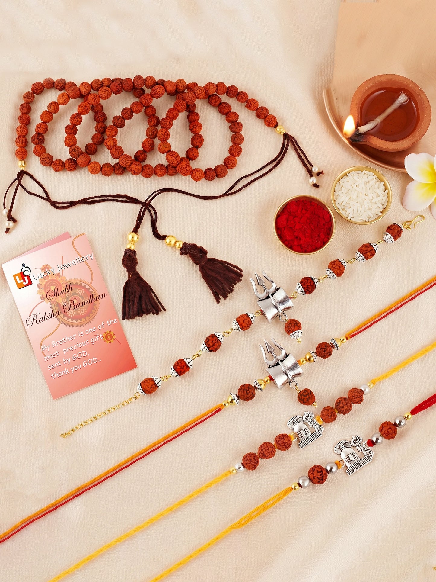Set of 5 Rudraksha & Silver Trishul Rakhi Set: Shiva-Themed, Metallic Accents, Roli, Chawal & Card (718-JPR1-1994-5-2026)