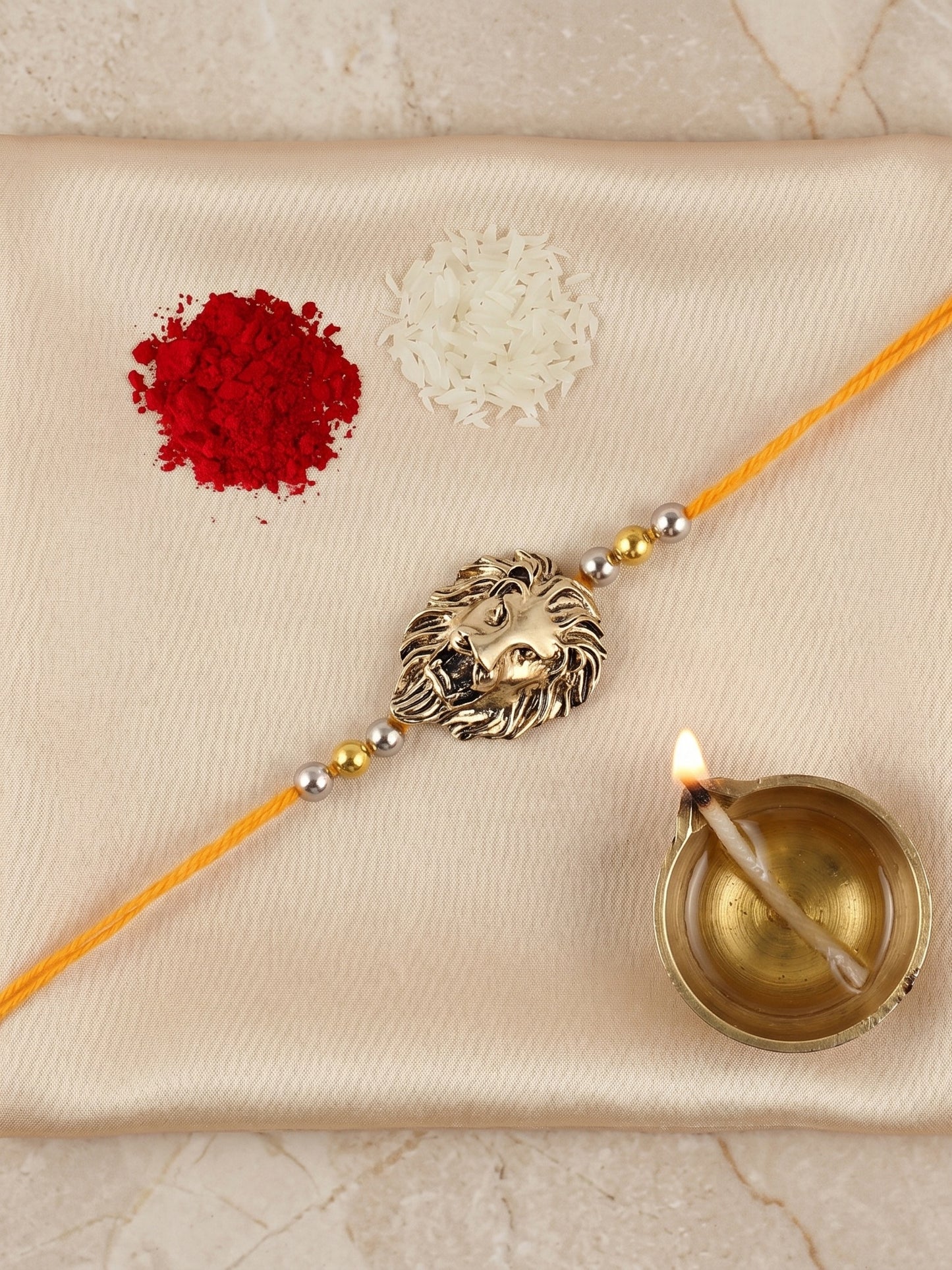 Golden Lion Pendant Rakhi for Brother with Metallic Beads, Roli Chawal & Card (140-CHR1-1175-1-2026)