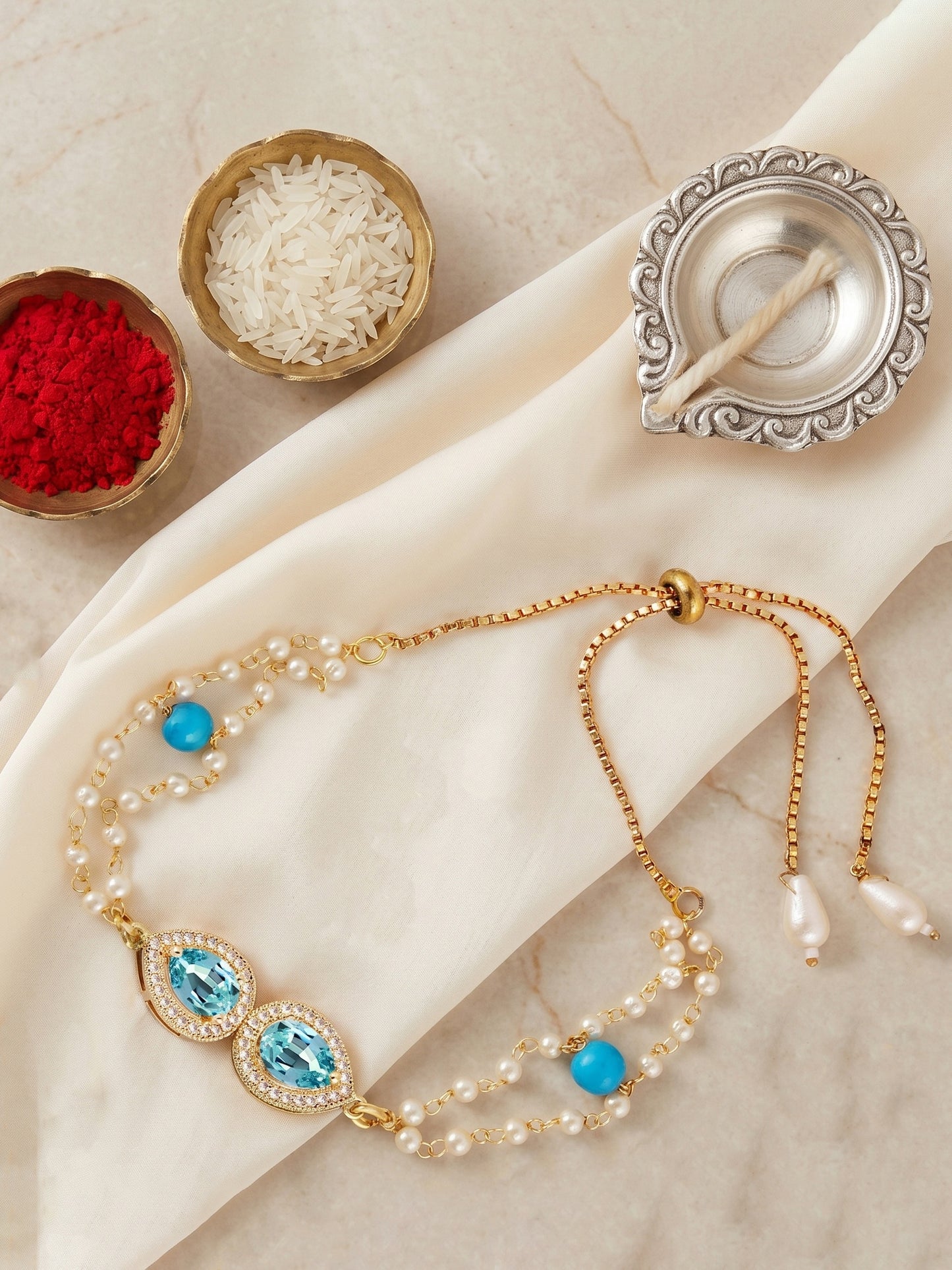 Adjustable Rakhi Bracelet with Blue drop AD Pendant, Turquoise & Beads,Roli Chawal & Card (233-CHB2-1279-F-2026)