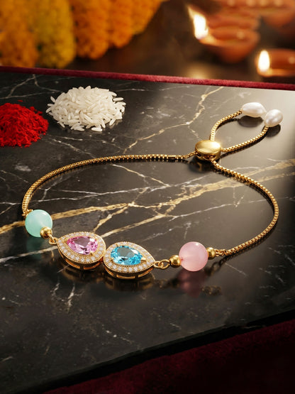 Adjustable Rakhi Bracelet with Blue & Pink drop AD Pendant,Pastel Beads,Roli Chawal & Card (209-CHB2-1279-PKF-2026)