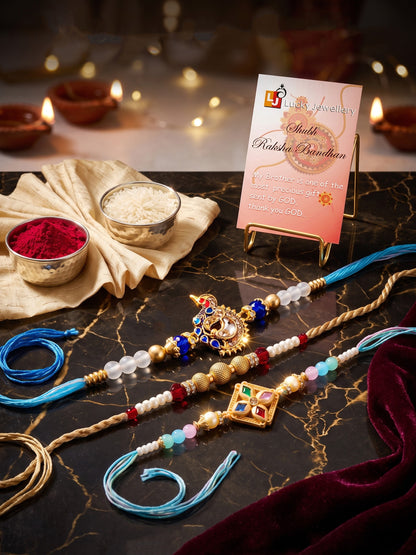 Lucky Jewellery Set of 3 Rakhi with Peacock & Square AD Pendants, Smooth White Beads, Roli Chawal & Card (142-S7R1-2318-3)
