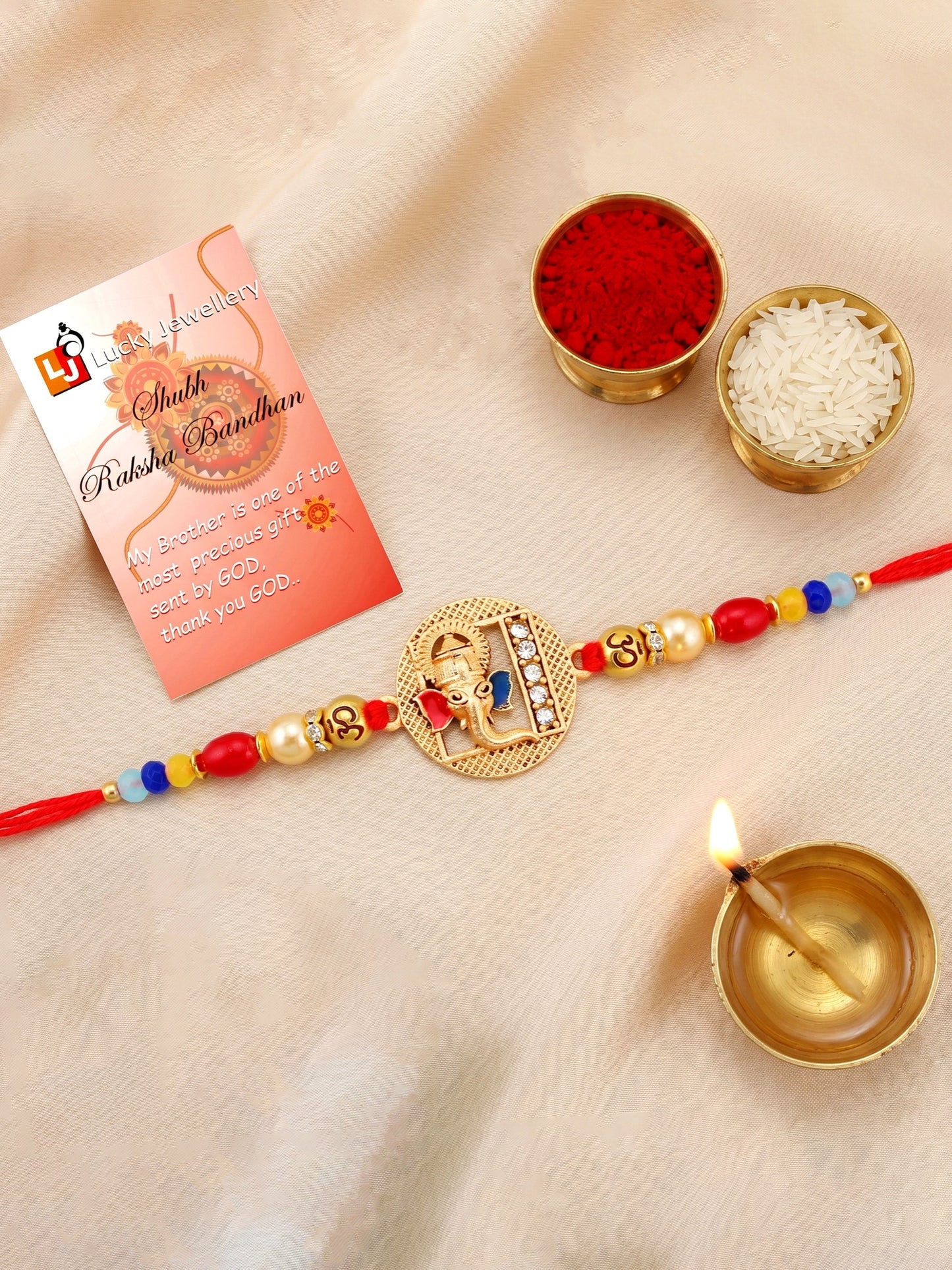 Divine Lord Ganesha & Spiritual Om Beaded Rakhi Set For Brother | With Roli Chawal & Greeting Cards (72-S5R1-AR2922)