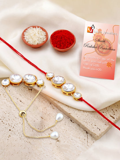 LUCKY JEWELLERY Rakhi for Brother/Bhaiya – Gold Plated Red Thread Rakshabandhan Rakhie in White Stones for Bhai/Bhabhi (Pack of 2) – Rakhee Bracelet with Pull Chain Rakshasutra (152-L1R1-10B-W-2-2026)