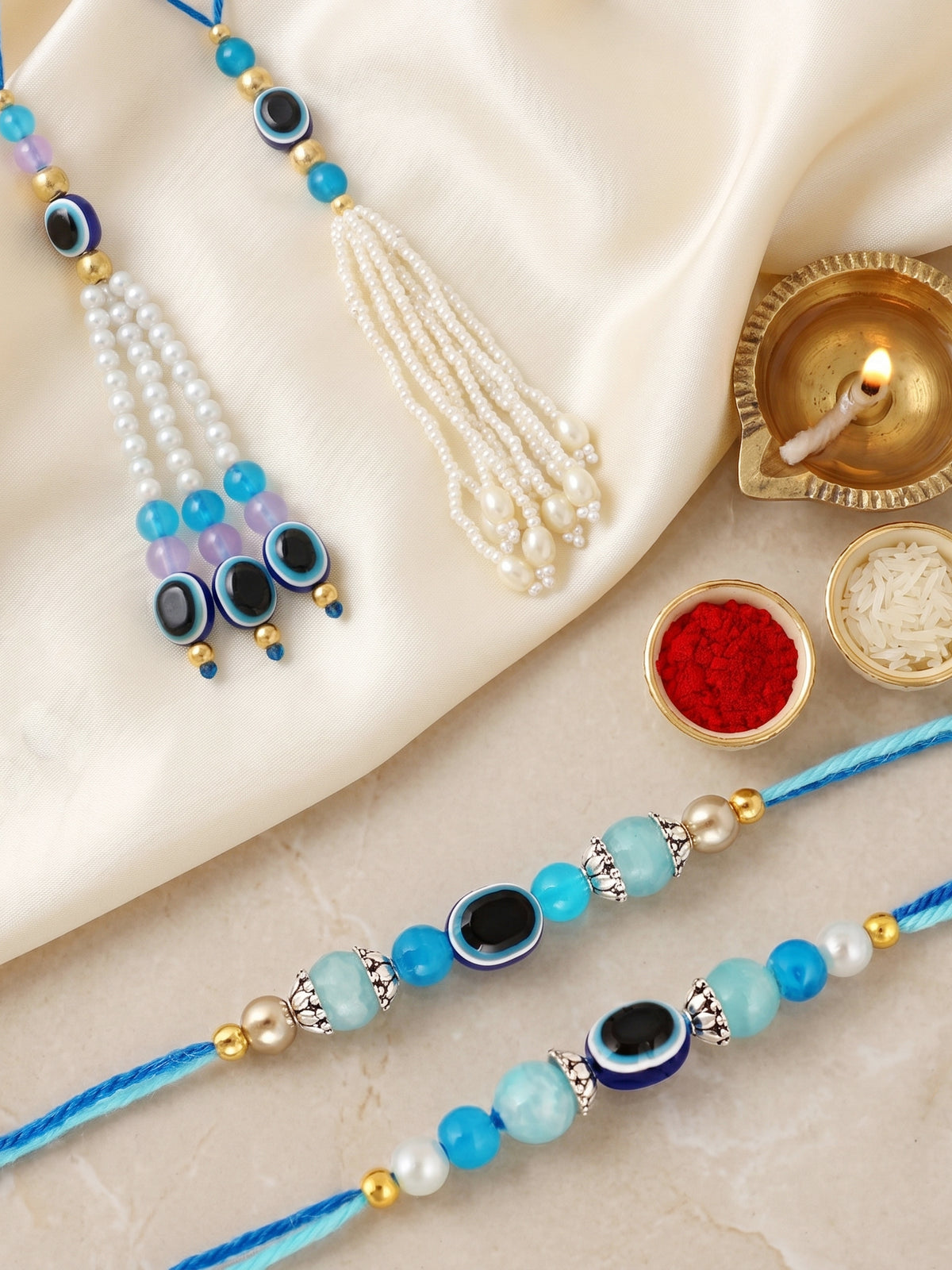 Rakhi Set of 4 with Small Evil Eye Lumba, Blue & Gold Beads, Roli Chawal & Card (116-J5R1-1991-EE-4-2026)