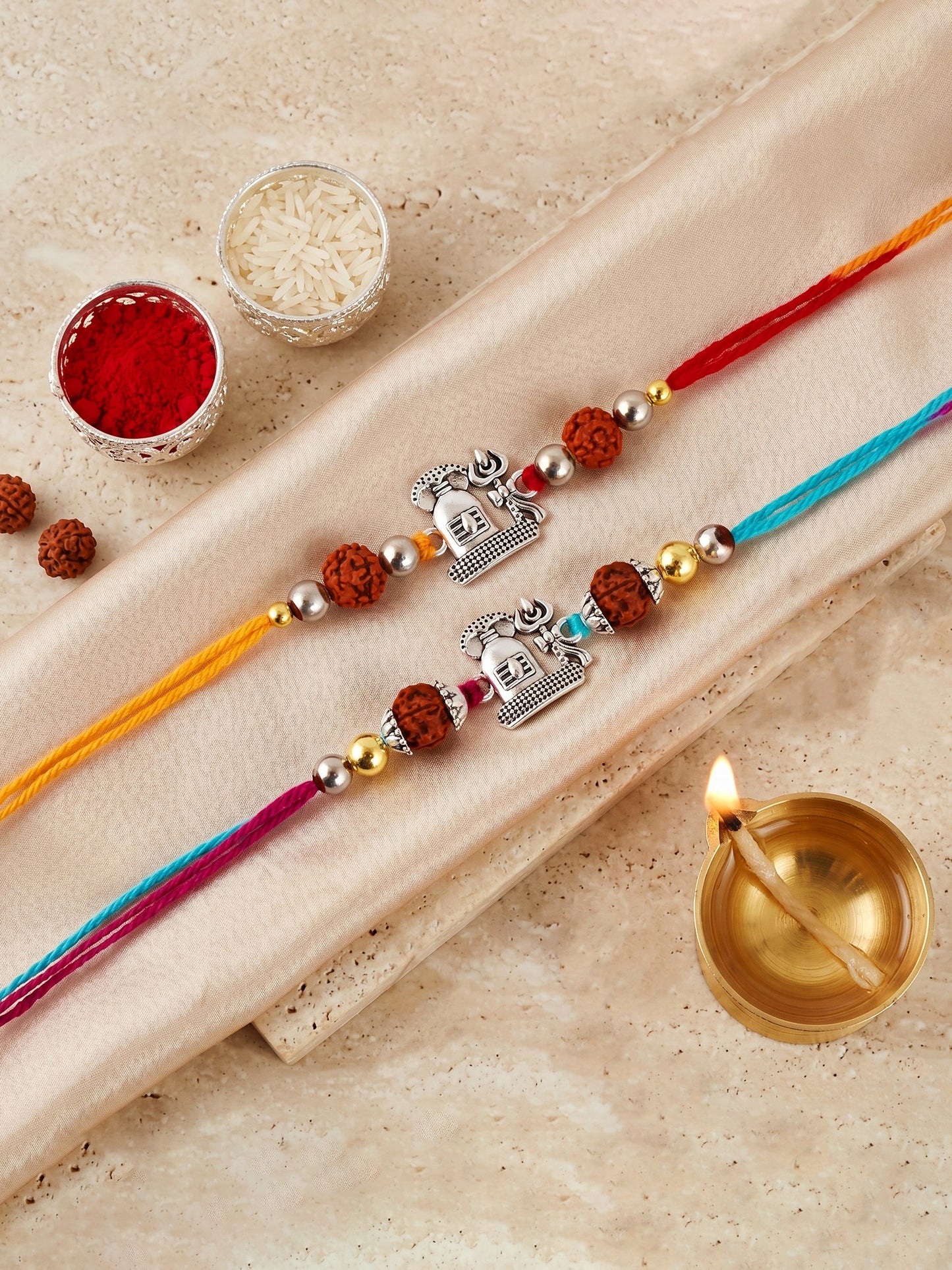 Set of 2 Silver Shivling Trishul Rakhi for Brother with Rudraksha, Roli & Chawal & Card (72-JPR1-1963-S-2-2026)