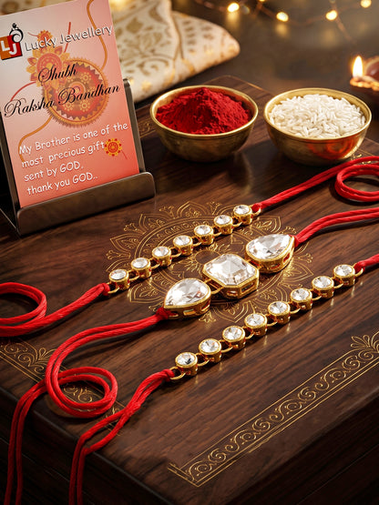 LUCKY JEWELLERY Traditional Rakhi for Brother/Bhaiya – Gold Plated Red Thread Rakshabandhan Rakhie White Stones for Bhai/Bhabhi (Pack of 3) – Fancy Rakhee Bracelet Rakshasutra (159-L1R1-08-W-3-2026)