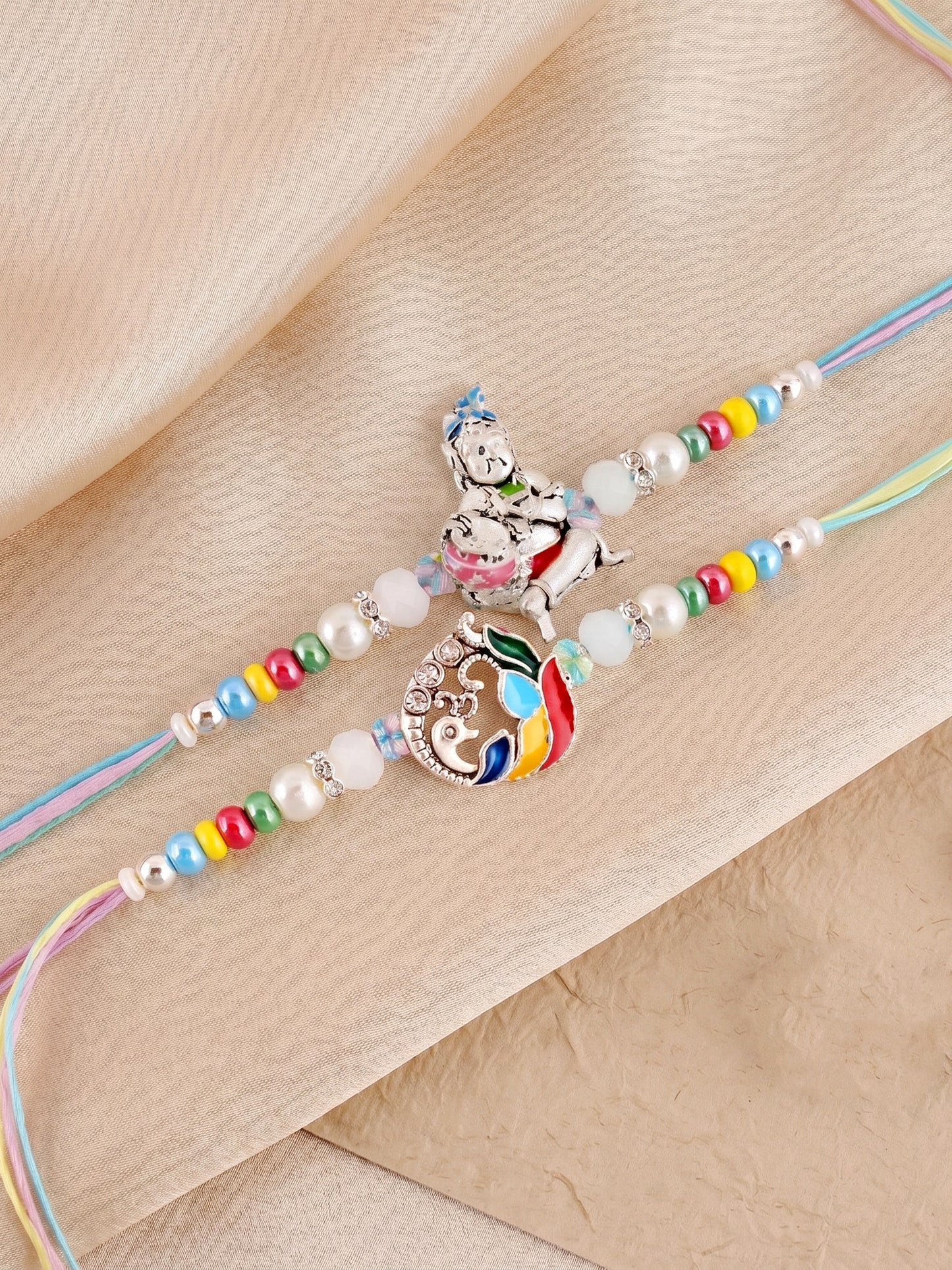 Lucky Jewellery Set of 4 Silver-Toned Bal Krishna & Peacock Rakhi for Brother | Designer Beaded Raksha Bandhan Threads with Roli, Chawal & Card (408-S5R1-2308-4)