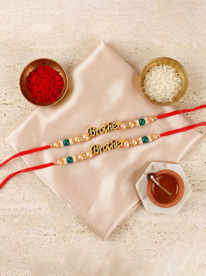 Lucky Jewellery Set of 2 Gold Brother Rakhi with Green Beads, Roli, Chawal & Card (66-CHR1-1964-2-2026)