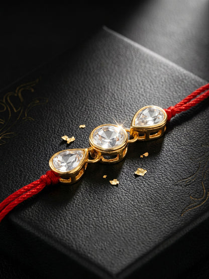LUCKY JEWELLERY Traditional Rakhi for Brother/Bhaiya – Gold Plated Red Thread Rakshabandhan Rakhie White Stones for Bhai/Bhabhi (Pack of 4) – Fancy Rakhee Bracelet Rakshasutra (159-L1R1-02-W-4-2026)