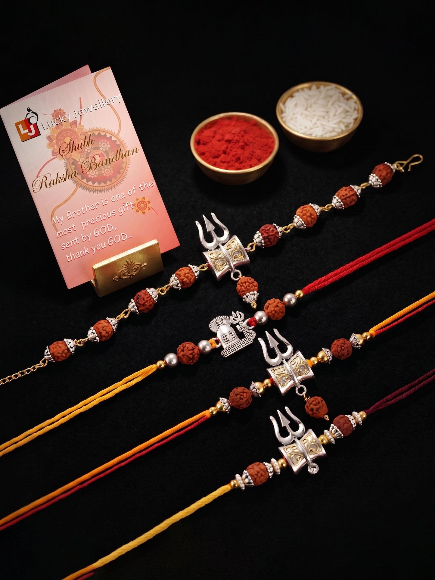 Rudraksha Rakhi Set of 4 for Brothers With Silver Trishul Design with Roli, Chawal & Card (241-JPR1-1982-S-4-2026)