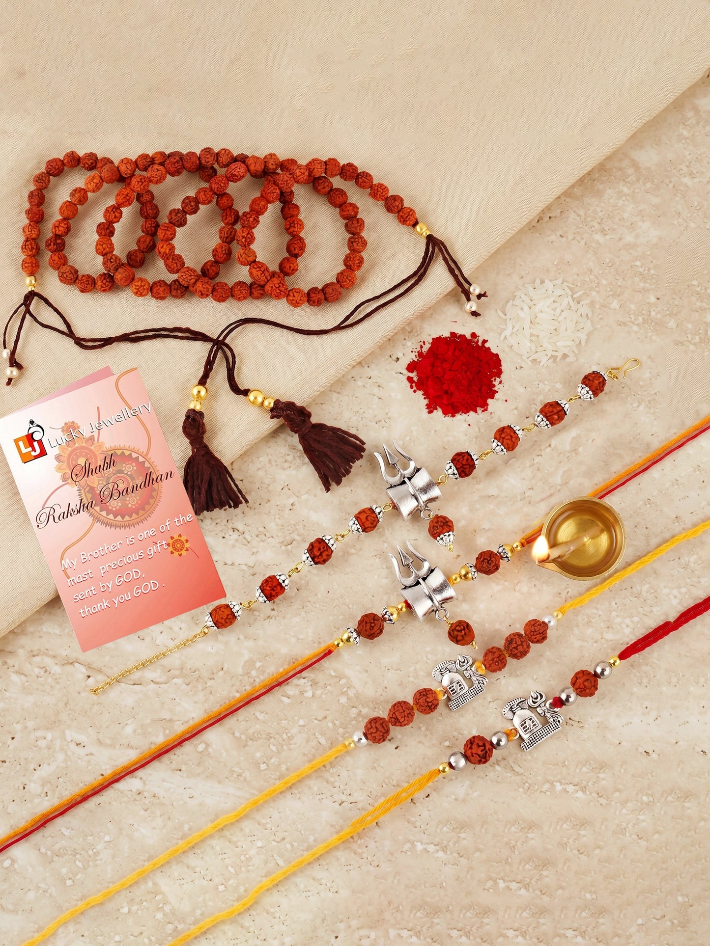 Set of 5 Rudraksha & Silver Trishul Rakhi Set: Shiva-Themed, Metallic Accents, Roli, Chawal & Card (718-JPR1-1994-5-2026)