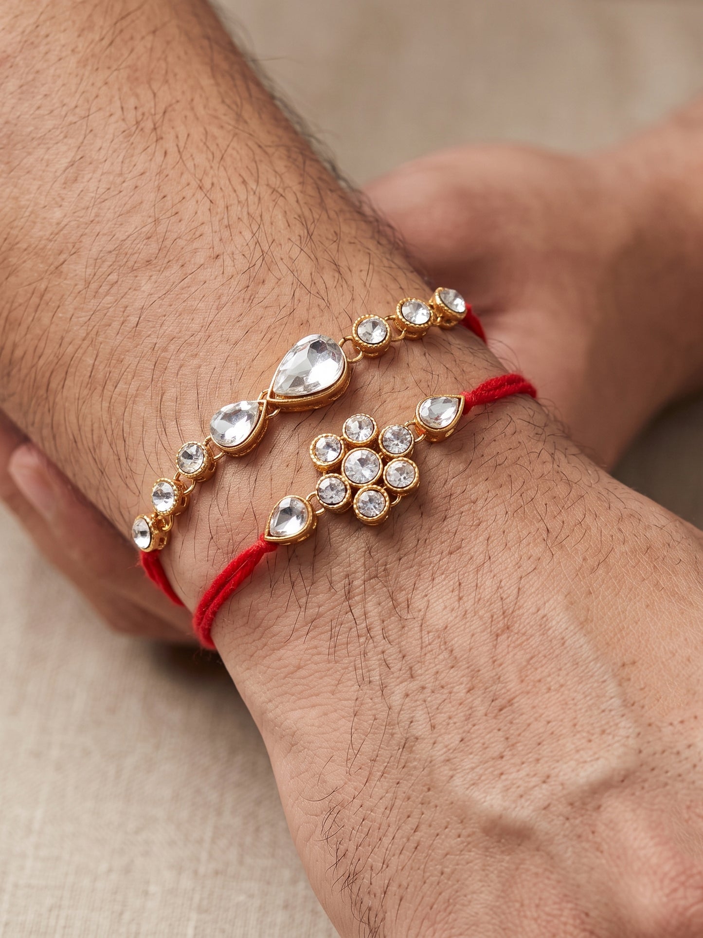 LUCKY JEWELLERY Traditional Rakhi for Brother/Bhaiya – Gold Plated Red Thread Rakshabandhan Rakhie White Stones for Bhai/Bhabhi (Pack of 4) – Fancy Rakhee Bracelet Rakshasutra (159-L1R1-02-W-4-2026)